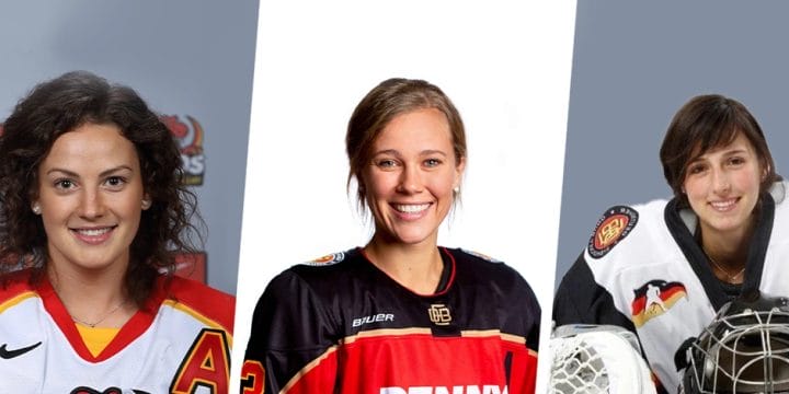 Female Hockey players wearing their team jersey