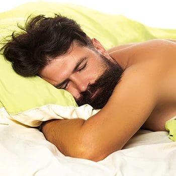 Bearded man in deep sleep