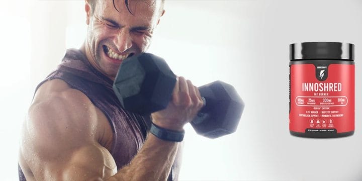 Muscular person lifting a heavy dumbbell