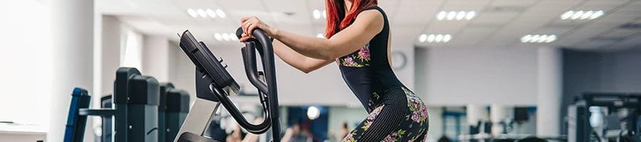A woman on a stairmaster