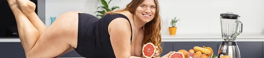 An oversized woman model smiling