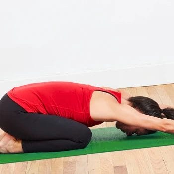 A yoga practitioner doing the Child's Pose