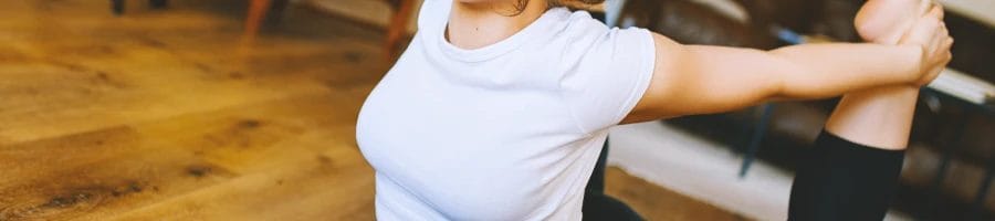 A woman stretching her chest