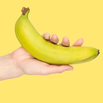 Holding a single banana