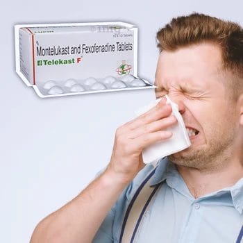A person sneezing with telekast f beside him