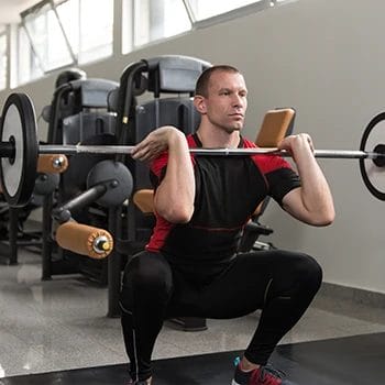 Man doing a barbell front squat
