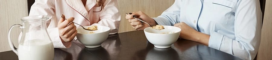 Two people eating more to lose weight