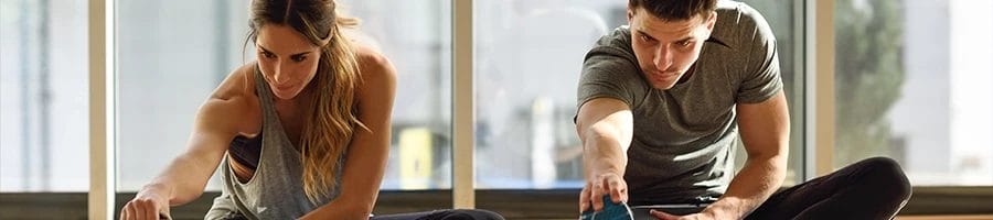 Stretching in a room with a partner