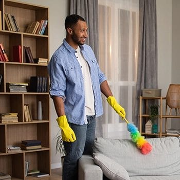Man doing chores in his house