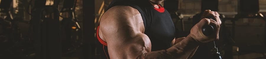 A man with high testosterone lifting in the gym