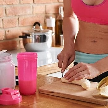 Cutting banana to make slices to pour into pre workout