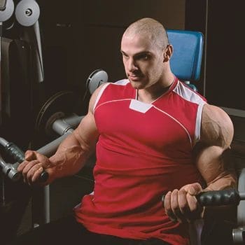 A man with high testosterone working out in the gym