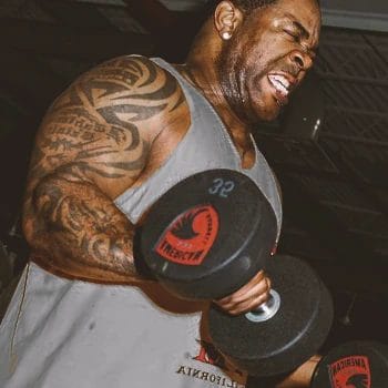 Busta Rhymes losing weight in the gym by lifting weights