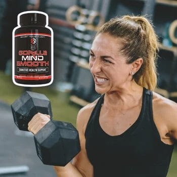 A woman working out intensely with gorilla mind smooth on the side