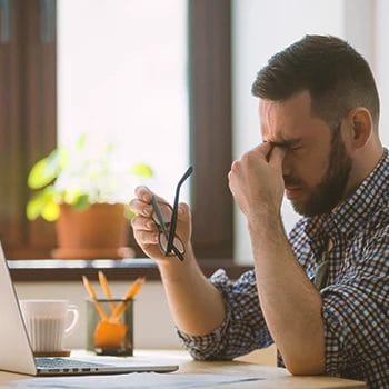 A man with a headache because of low testosterone