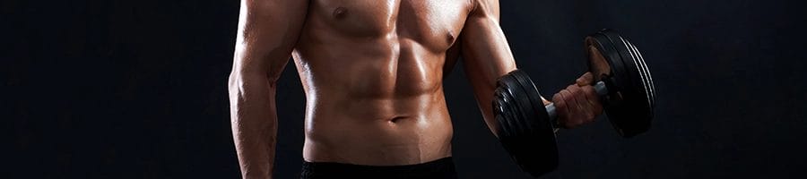 Holding a dumbbell doing bicep curls