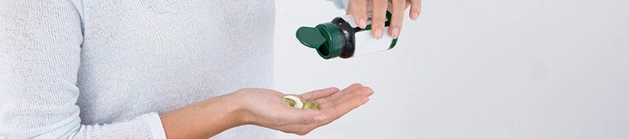 Pouring fat burners on hand
