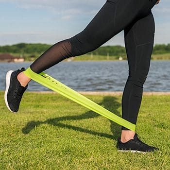 Walking using a resistance band outdoors