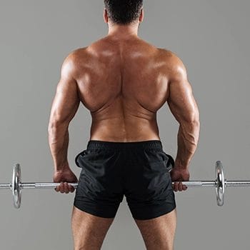 Performing rack pulls using barbell