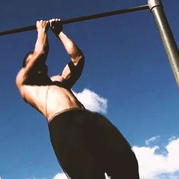 A person doing a commando pull up