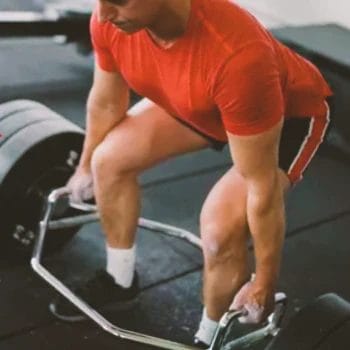 A person doing deadlift practices