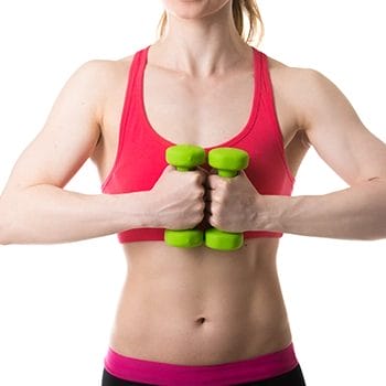 Holding two dumbbells in front of chest