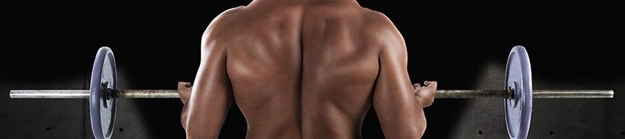 Holding barbell while showing back muscle