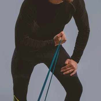 A person doing a resistance band bicep curl