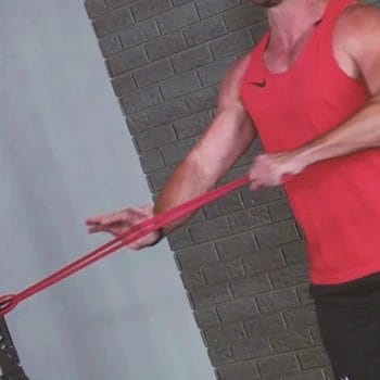A person doing a rotation band workout
