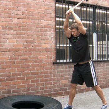 Using a sledgehammer to slam a tire