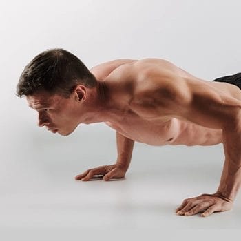 Performing push ups indoors