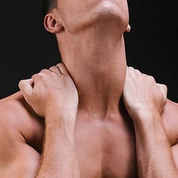 Man showing platysma muscle on his neck