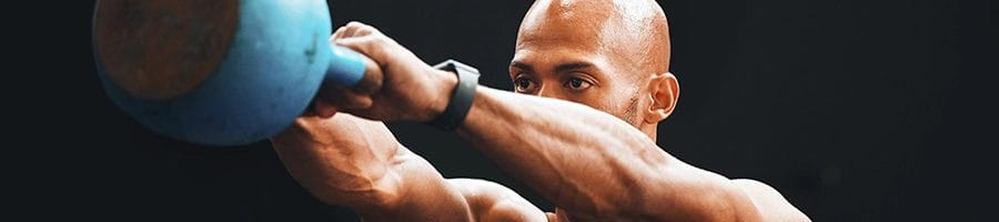 Swinging kettlebell for arm exercises