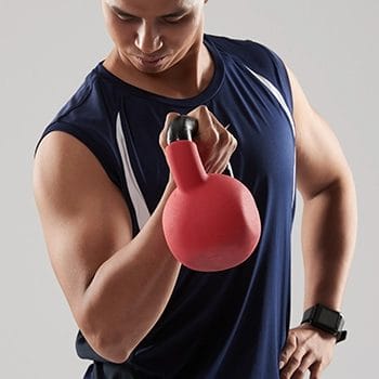 Doing bicep curl using kettlebell