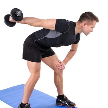 Man doing tricep blaster kickbacks