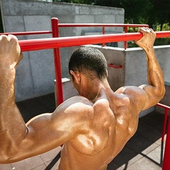 Performing wide grip pull ups