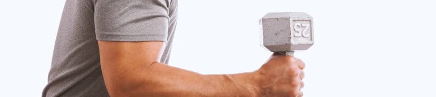 A person holding one dumbbell