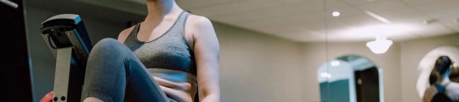 Person exercising in a room with a low ceiling