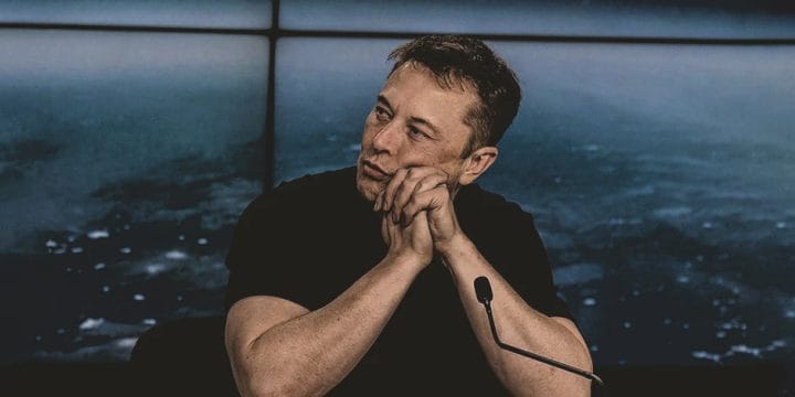 Elon Musk at his station thinking about workout