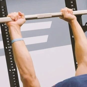 A person doing close grip bench press