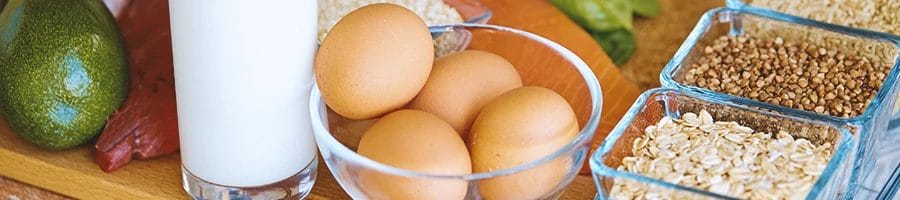 Close up shot of eggs and oatmeal and milk