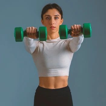 A person doing dumbbell front raises