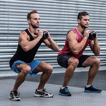 Performing goblet squat variations