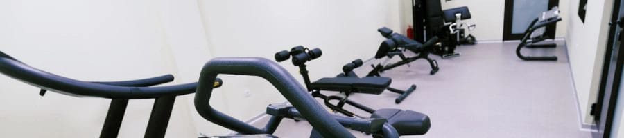 Home gym equipment in a row