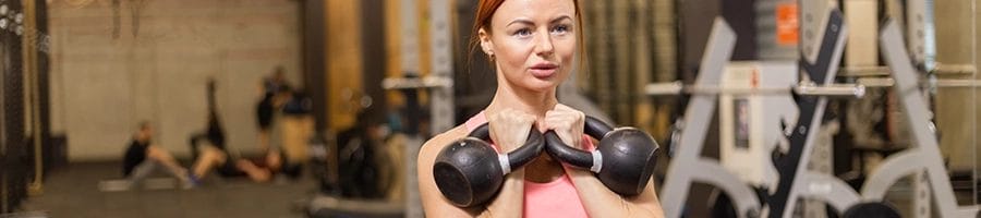 Starting position of crush grip goblet squat