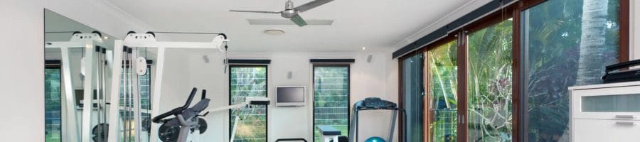 Long home gym showing the ceiling