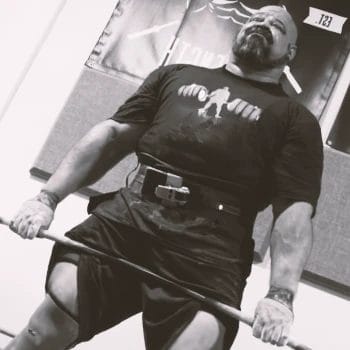 Strongman Brian Shaw working out in his home gym