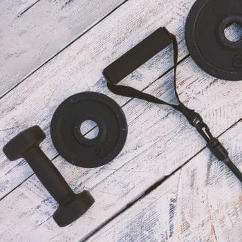 Close up shot of various strongman training equipment
