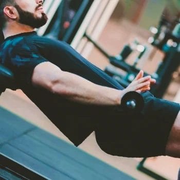 A person doing barbell hip thrusts