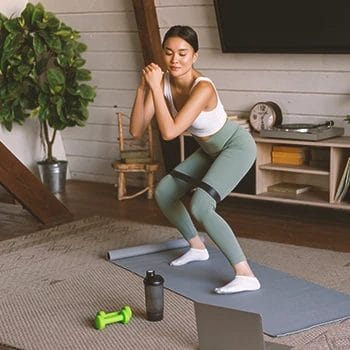 A woman working out at home